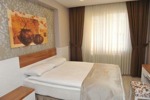 Apartamento Qamar Prestige Suites