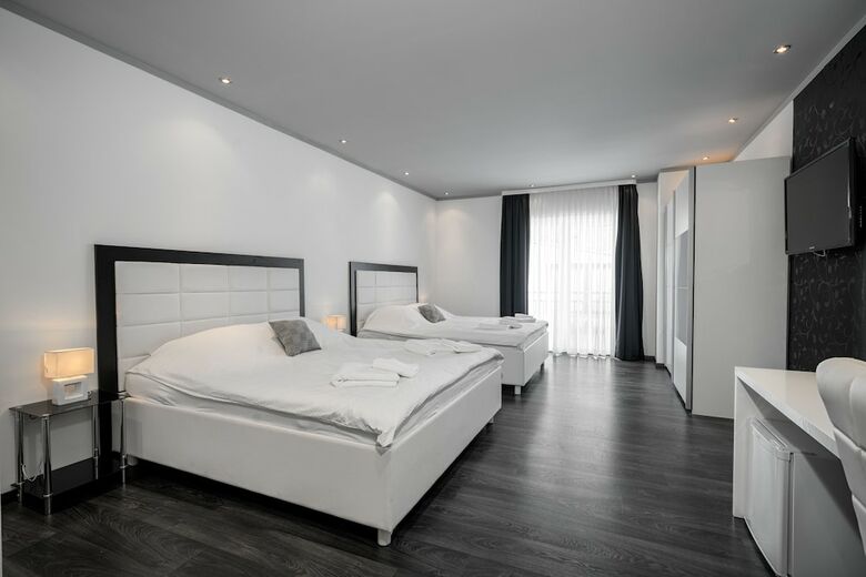 Apartamentos The Suites - Small Luxury Living