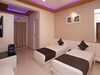Hotel Capital O 9670 Gg Holiday Apartment
