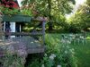 Open Wooden Chalet Built Against A Hill