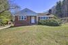 Quaint Creekside Home With Spacious Deck And Yard