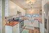 Updated Townhome With Deck, Grill And Sunroom!